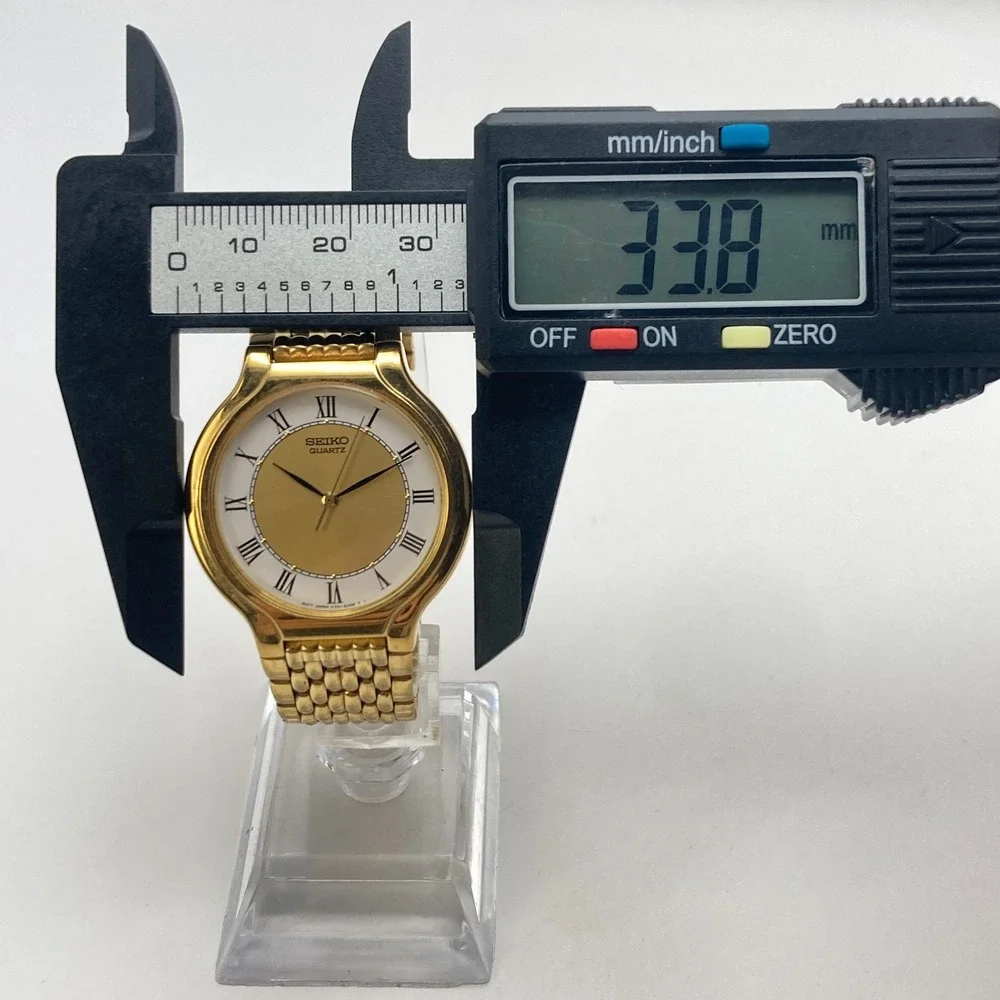 Vintage Seiko Men's Watch 34mm Gold Tone V701-6K69 New Battery SMALL 6.75